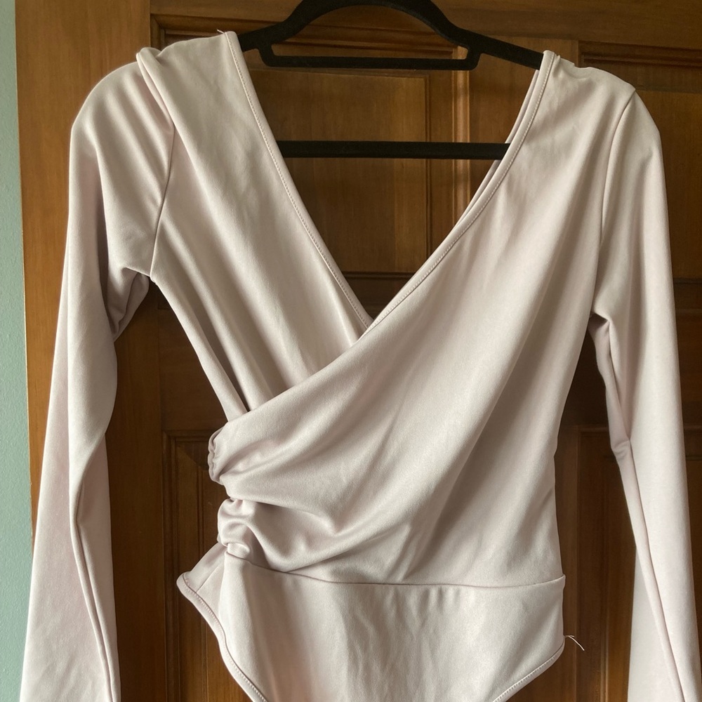 Women’s bodysuit cream like new